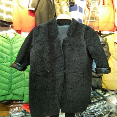 冬季新款中长款皮毛一体西装领毛呢外套韩版卷边秀黑绒绒女式大衣