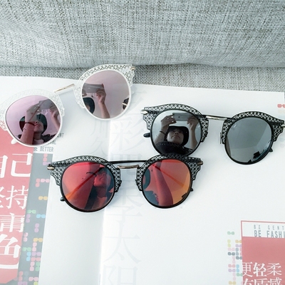 韩版时尚偏光太阳镜镂空气质复古防炫光镀膜炫彩司机沙滩旅游镜