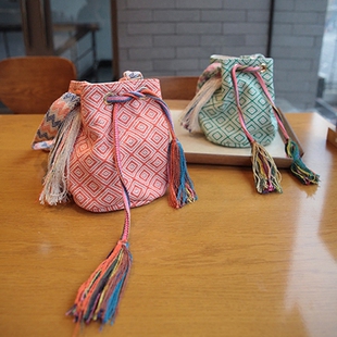 2016夏季新款韩国东大门度假民族风流苏手工编织水桶包斜跨女小包