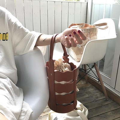2018新款韩国东大门同款水桶包女士镂空流苏手提包百搭单肩包包