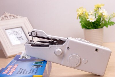 手持电动缝纫机 正品 迷你缝纫机 缝纫机 迷你 电动 针织机0.31