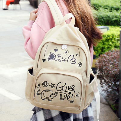 日韩版帆布双肩包女学院风印花学生书包大容量潮流旅行包简约背包